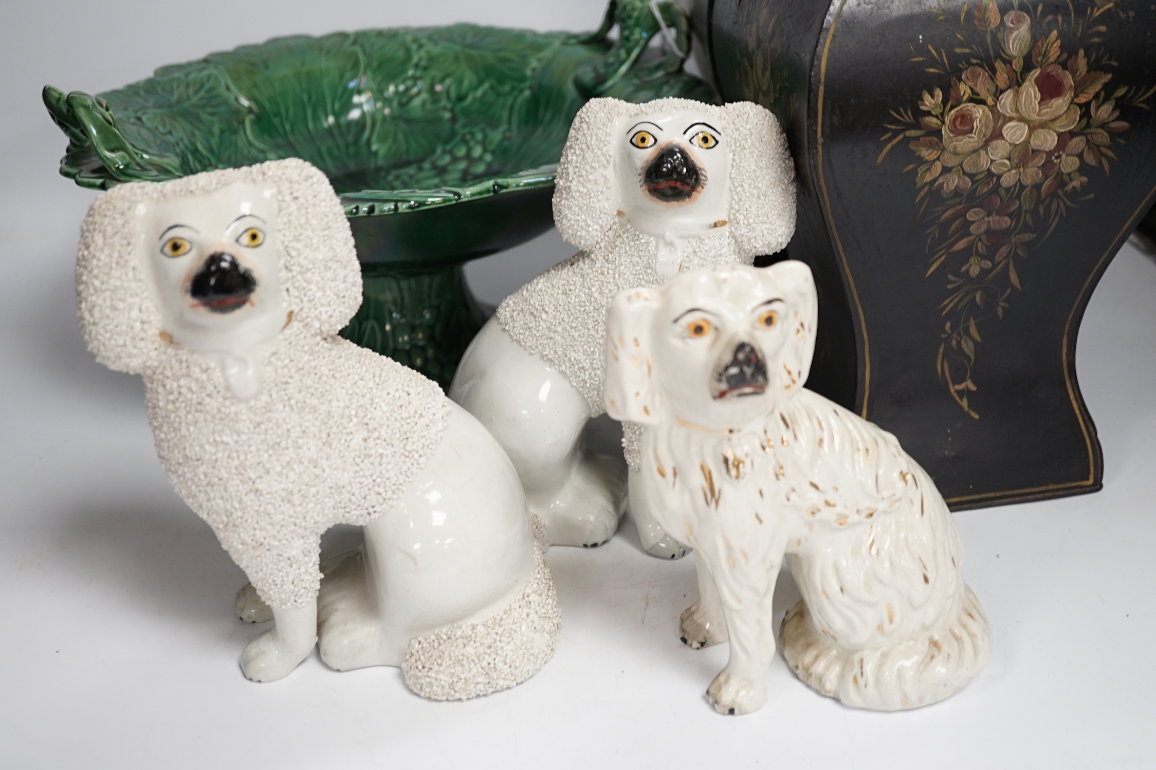 Three Staffordshire dogs, a green leaf pedestal dish and a pair of toleware vases, pedestal dish 30cm diameter